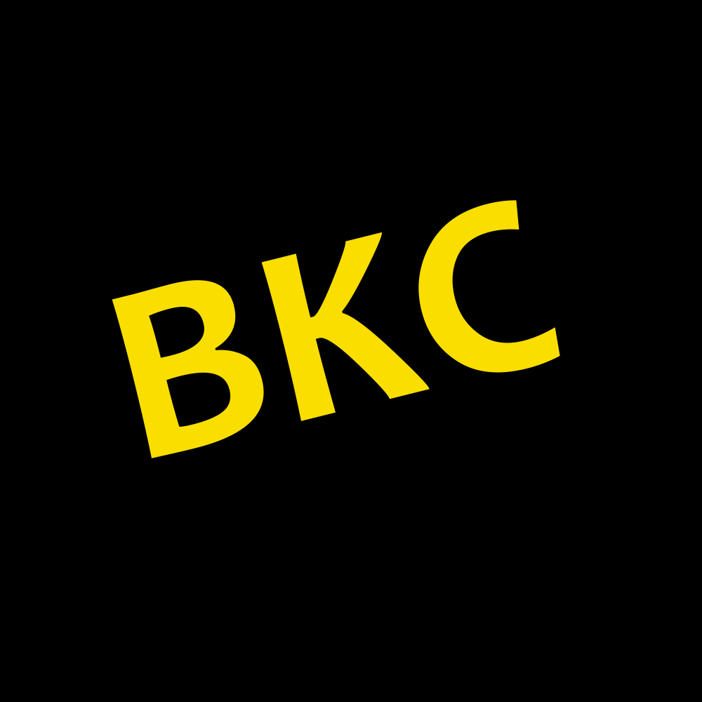 BKC compact badge, yellow on black.